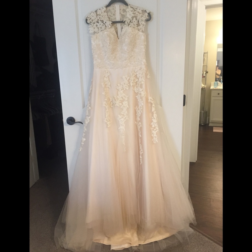 Custom made wedding gown worn once.